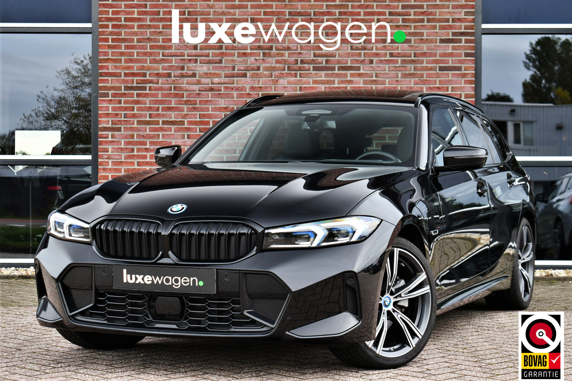 BMW 3 Serie Touring 330e M-Sport 57322184-0.jpg | Luxewagen